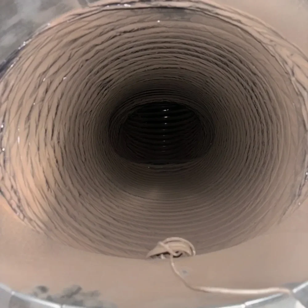 Looking down the inside of a flexible duct run
